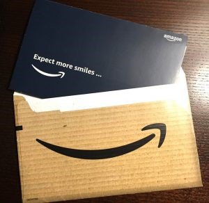 Image of Amazon branded brown envelope with mail inside